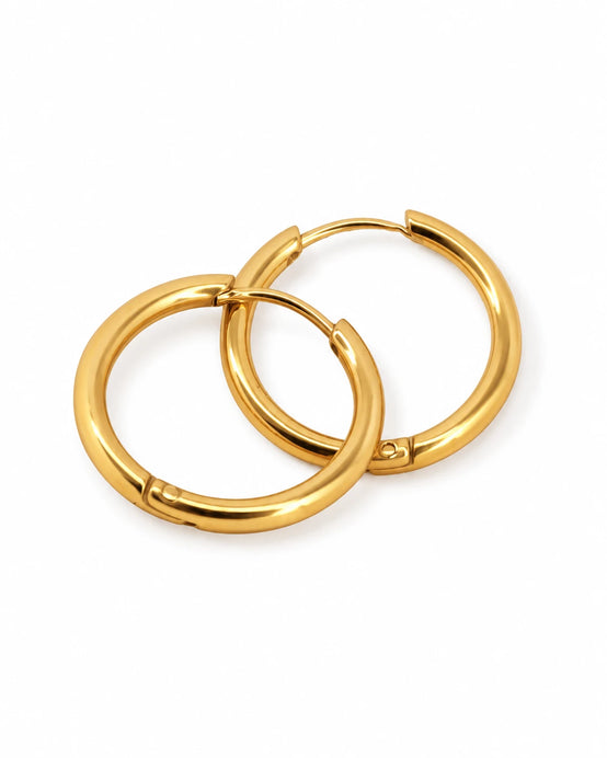 FLEURENZ HELEN gold hoop earrings on a white background